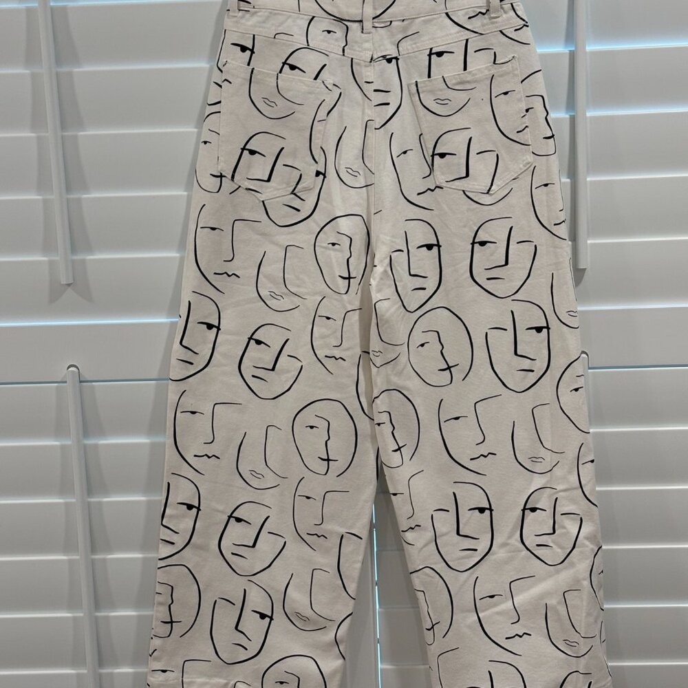 Shekou "Little Things" white denim jeans with a black abstract face print - Picture 2 of 9